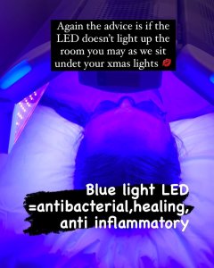LED BLUE light therapy being used to treat acne on a womens face